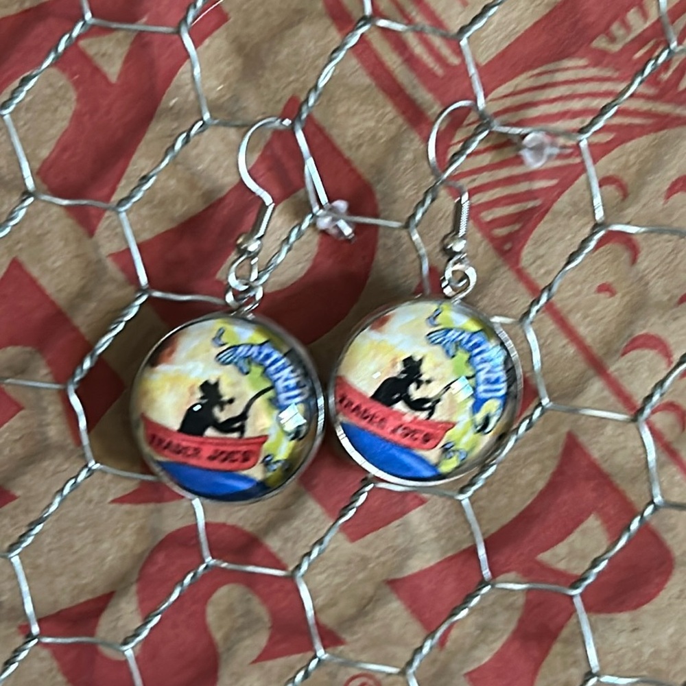 Trader Joe’s earrings 20mm guy in a boat